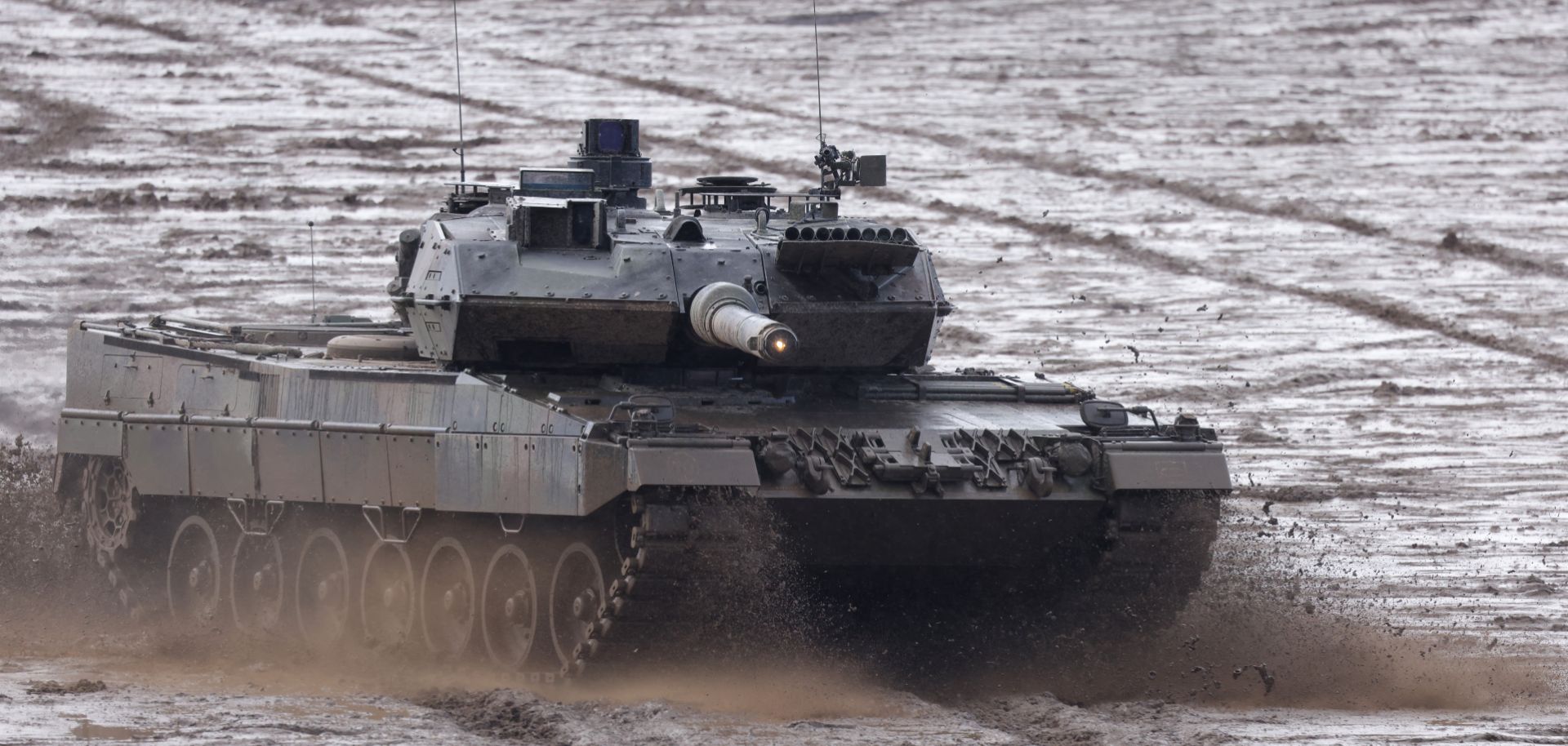 A Leopard 2 A6 heavy battle tank participates in a demonstration of capabilities during a visit by German Defence Minister Christine Lambrecht to the Bundeswehr Army training grounds on Feb. 7, 2022, in Munster, Germany. 