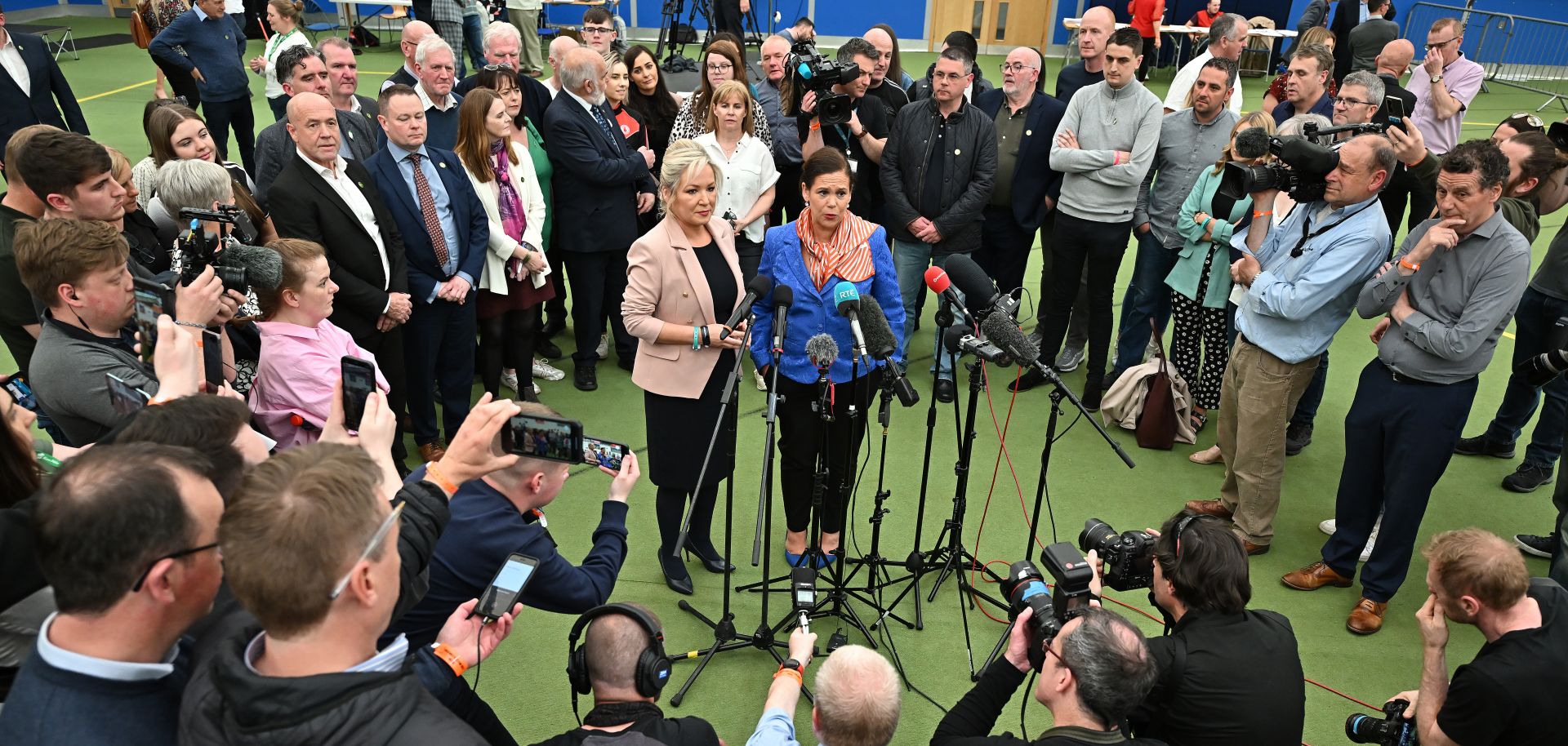 Michelle O'Neill (center, left) and Mary Lou McDonald -- the vice president and president, respectively, of the Irish political party Sinn Fein -- speak to reporters on May 07, 2022, after the results of Northern Ireland's legislative election were announced.