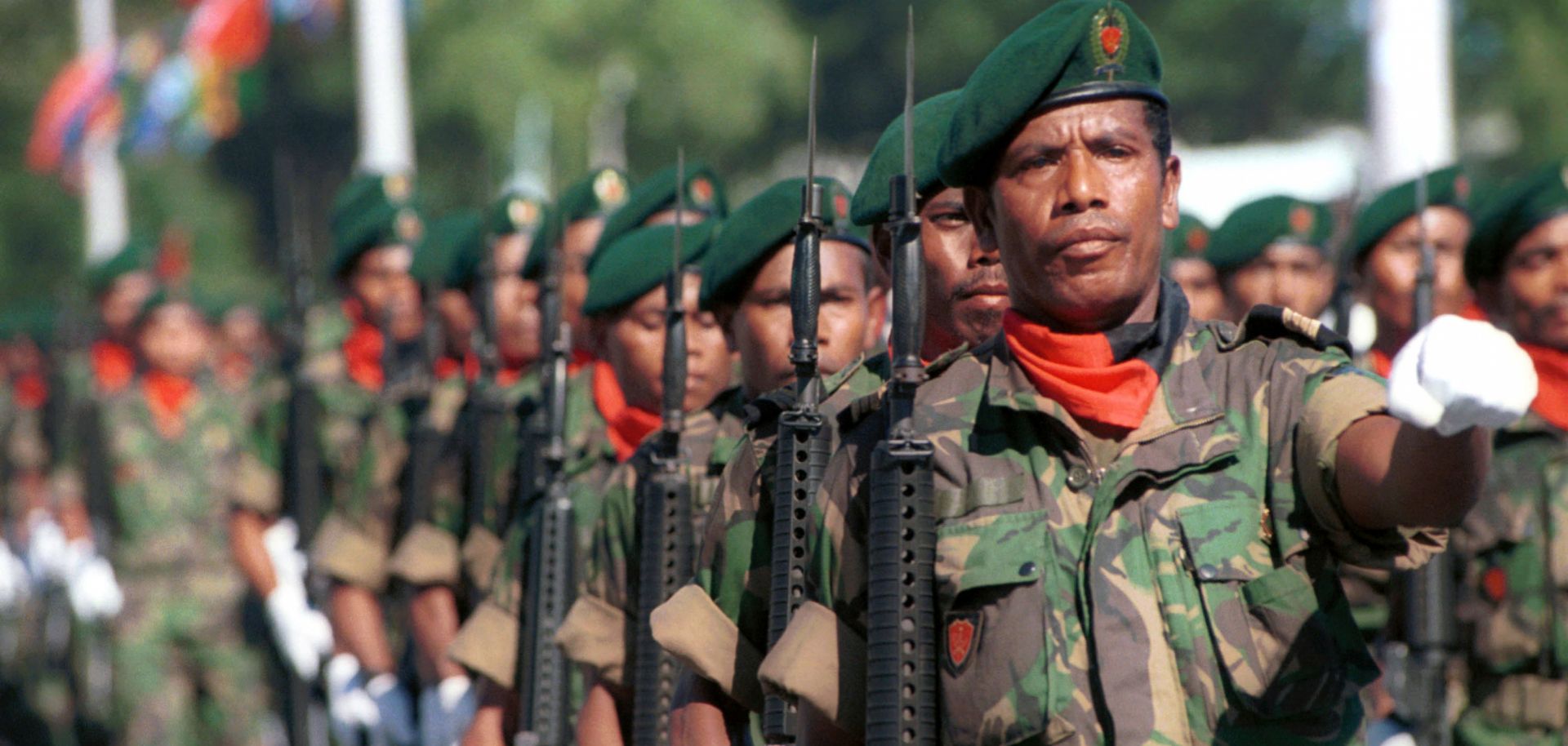 Members of the East Timorese Defense Force march in a parade during independence celebrations in Dili on May 20, 2002.