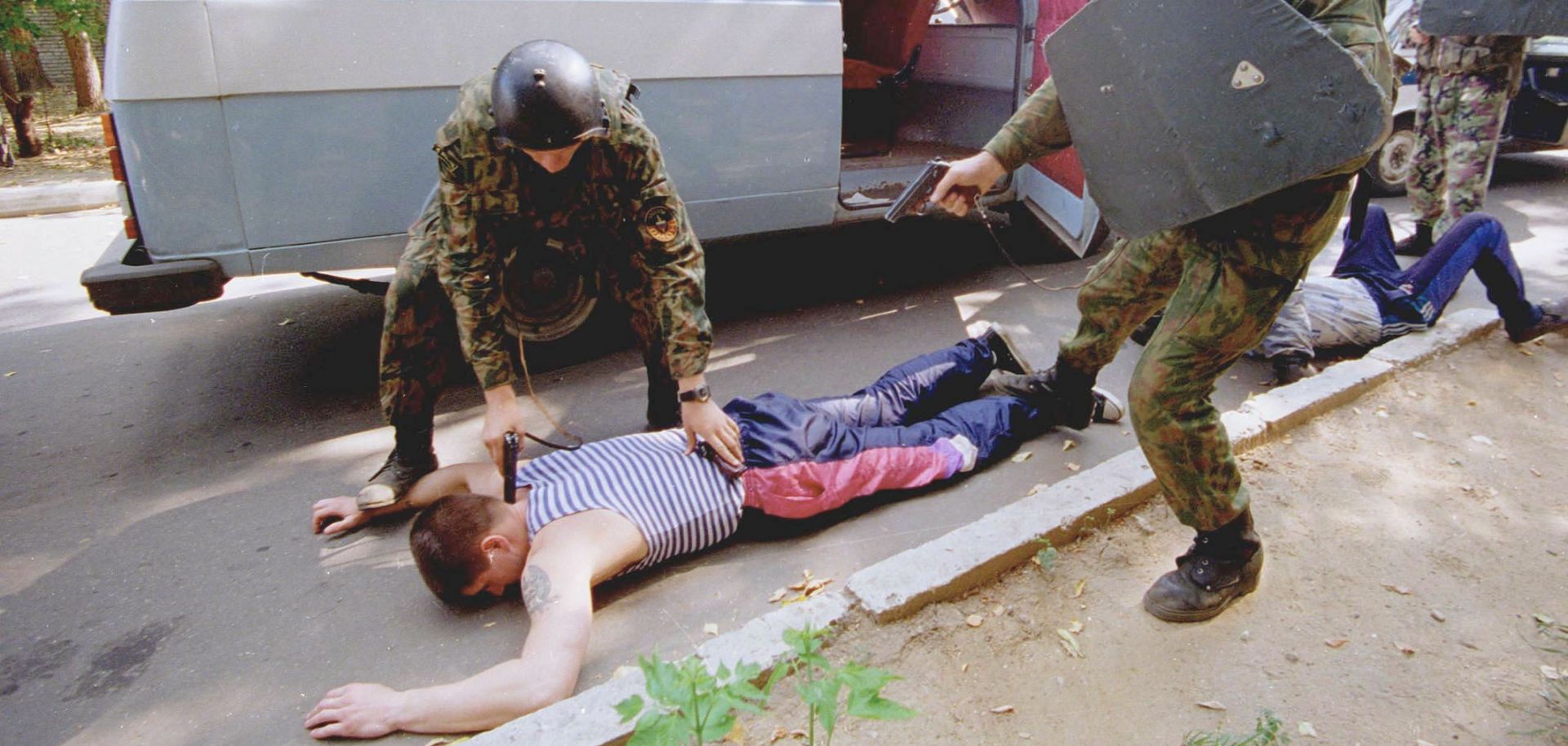 Moscow special forces police arrest a suspected mafia car thief, August 24, 1997.