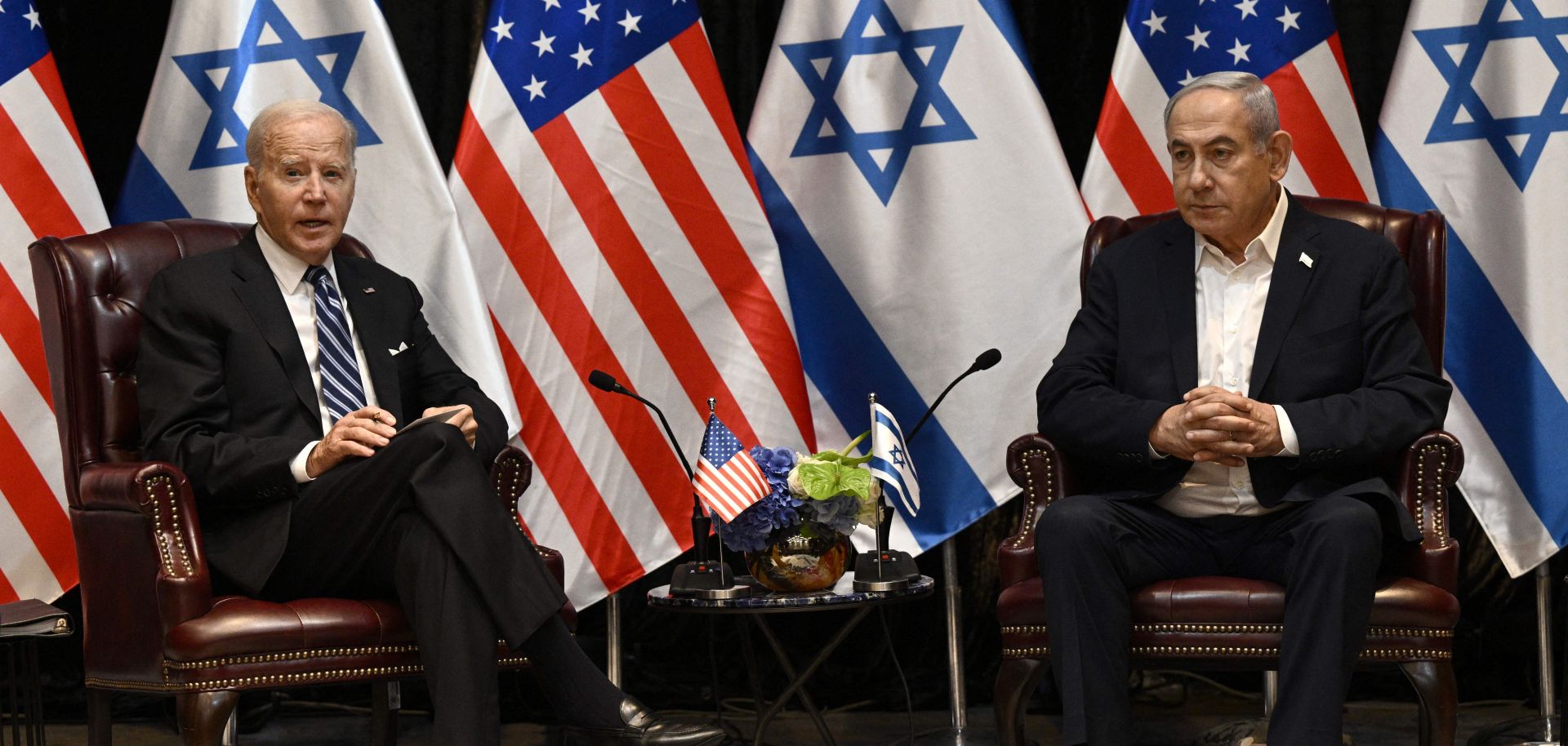 U.S. President Joe Biden (left) and Israeli Prime Minister Benjamin Netanyahu are seen during a meeting of Israel's War Cabinet on Oct. 18, 2023.