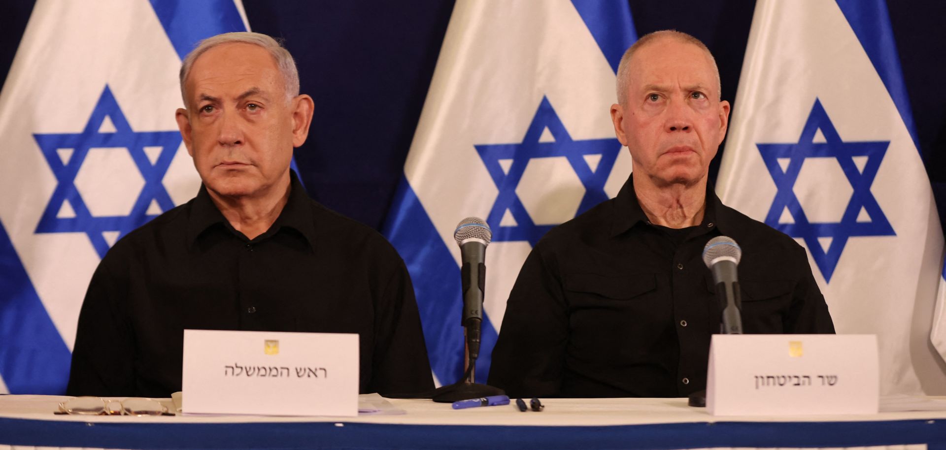 Israeli Prime Minister Benjamin Netanyahu (left) and Defence Minister Yoav Gallant attend a press conference in the Kirya military base in Tel Aviv on Oct. 28, 2023, amid ongoing battles between Israel and the Palestinian group Hamas. 