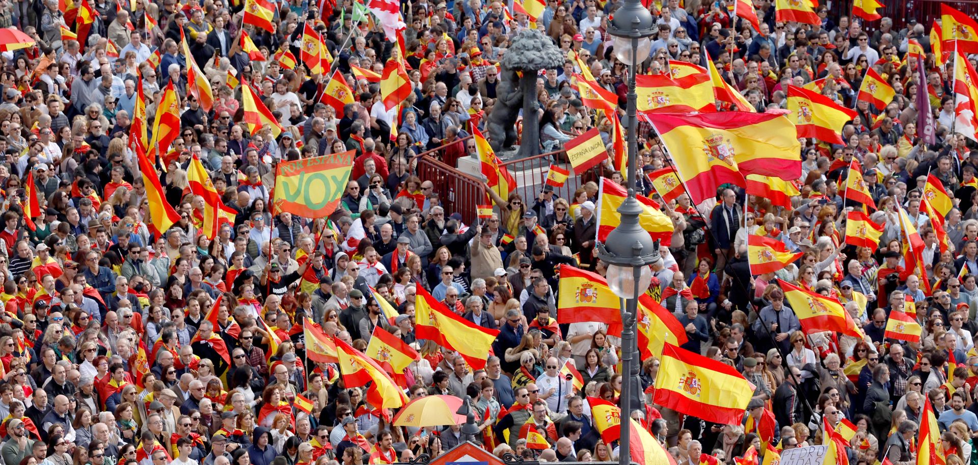 Demonstrators hold Spanish flags during a protest called by the country’s far-right Vox party in Madrid, Spain, on Nov. 12, 2023. 