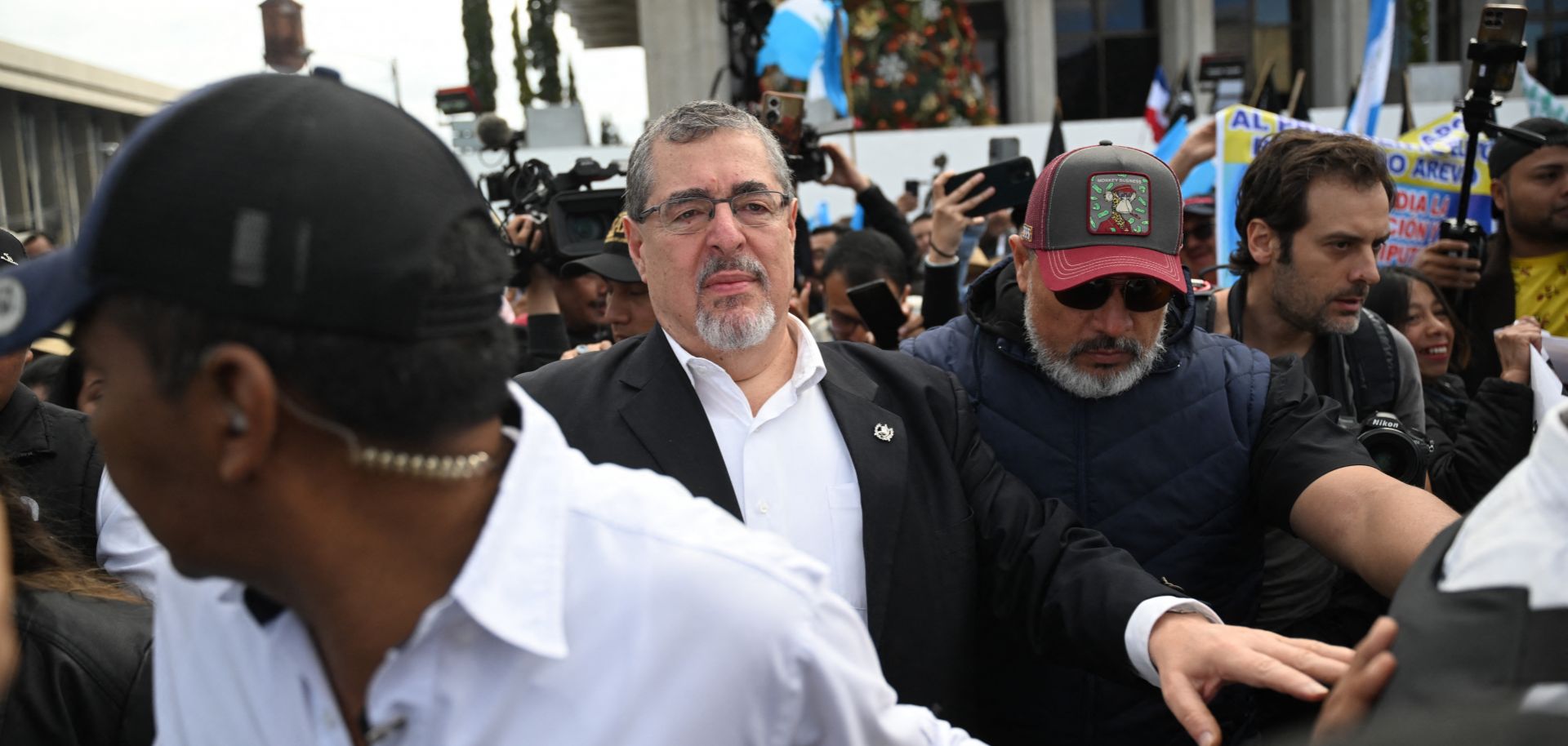 Guatemalan President-elect Bernardo Arevalo (center) takes part in a protest to demand the resignation of Attorney General Consuelo Porras and prosecutor Rafael Curruchiche, accused of generating an electoral crisis, in Guatemala City on Dec. 7, 2023. 