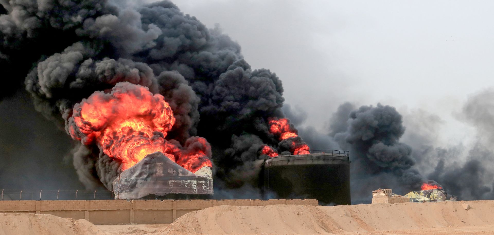 Smoke billows from a fire at oil storage tanks in Hodeidah, Yemen, a day after Israeli strikes hit the city’s port on July 21, 2024. 