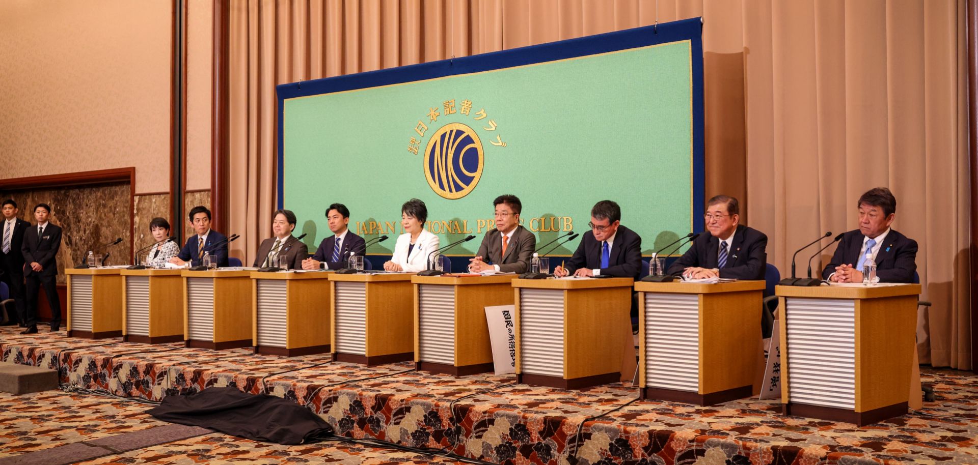 The candidates for Japan's ruling Liberal Democratic Party's (LDP) leadership election sit on stage during a debate in Tokyo on Sept. 14, 2024.