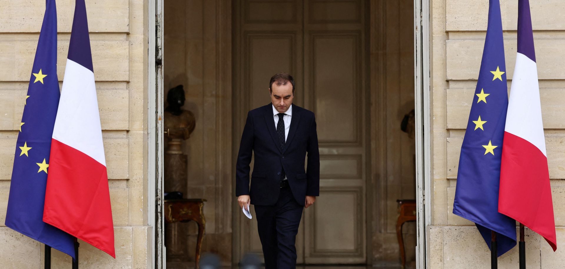 Outgoing French Prime Minister Sebastien Lecornu arrives to deliver a statement at the Hotel Matignon in Paris after submitting his resignation to French President Emmanuel Macron on Oct. 6, 2025. 