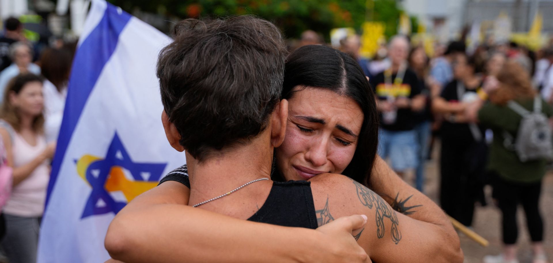 People react at Hostage Square in Tel Aviv on Oct. 9, 2025, following news of a new Gaza ceasefire deal.