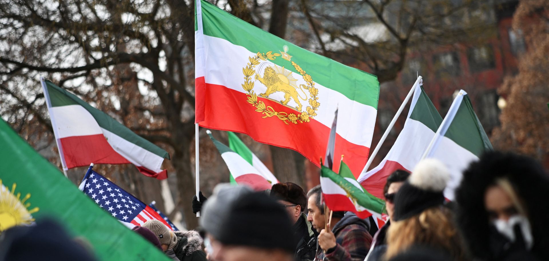 Activists hold Iranian flags in support of the ongoing protests in Iran during a rally in Washington, D.C., on Jan. 3, 2026.