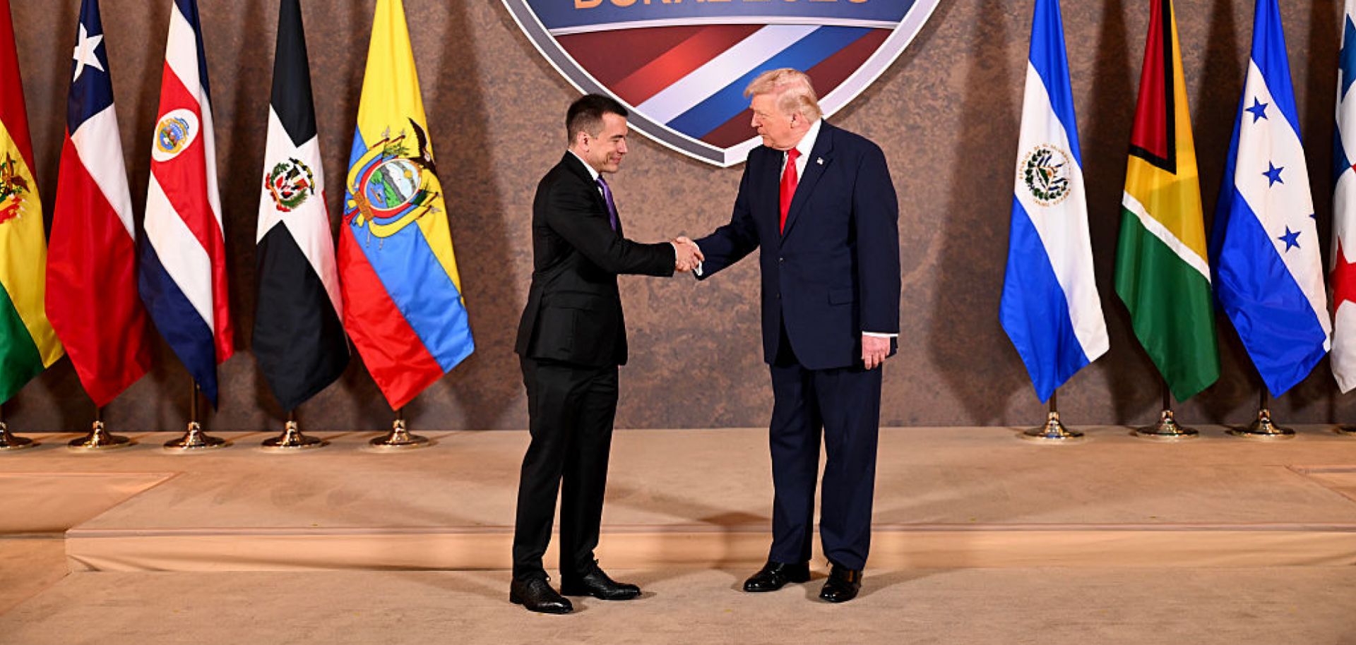 U.S. President Donald Trump greets Ecuadorian President Daniel Noboa at his "Shield of the Americas" summit, a gathering with heads of state and government officials from 12 countries in the Americas at the Trump National Doral Golf Club on March 7, 2026, in Doral, Florida. 