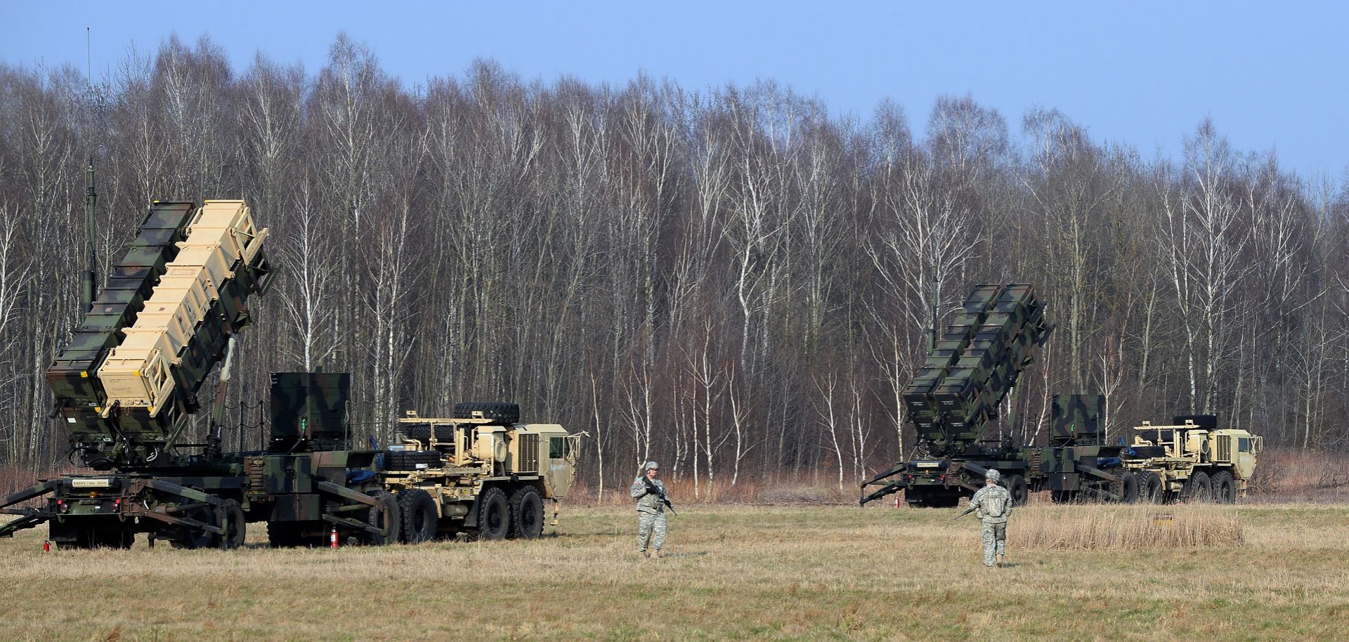 U.S. troops stand near Patriot air and missile defense systems in Sochaczew, Poland, during a 2015 military exercise meant to demonstrate the U.S. military's capacity to rapidly deploy such systems within NATO territory. 