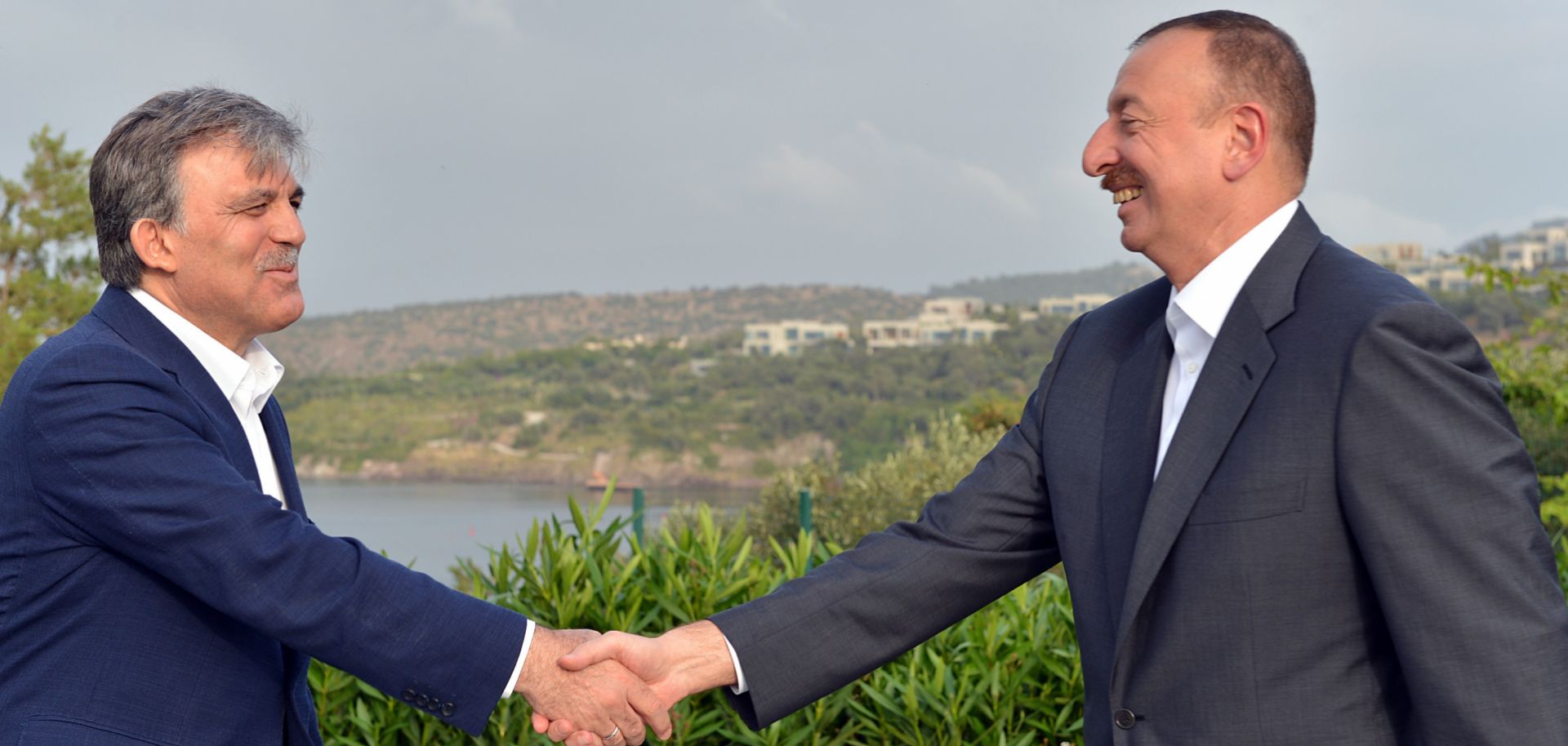 Turkish President Abdullah Gul and Ilham Aliyev President of Azerbaijan shake their hands.
