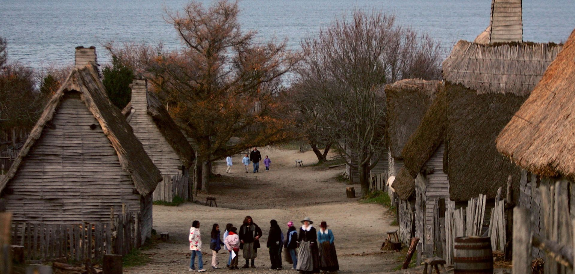 People visit the 1627 Pilgrim Village at "Plimoth Plantation," where role-players portray pilgrims seven years after the arrival of the Mayflower, in November 2005. 