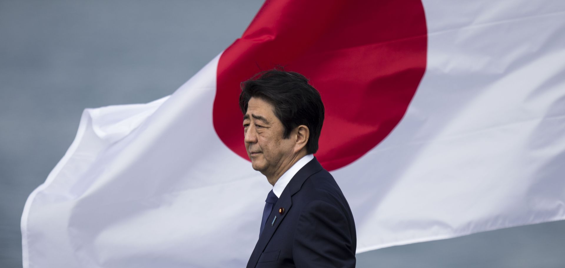 Shinzo Abe visits Joint Base Pearl Harbor-Hickam’s Kilo Pier in Honolulu, Hawaii on Dec. 27, 2016. Abe was the first Japanese prime minister to visit Pearl Harbor with a U.S. president and the first to visit the USS Arizona Memorial cataloging the toll of the 1941 attack.