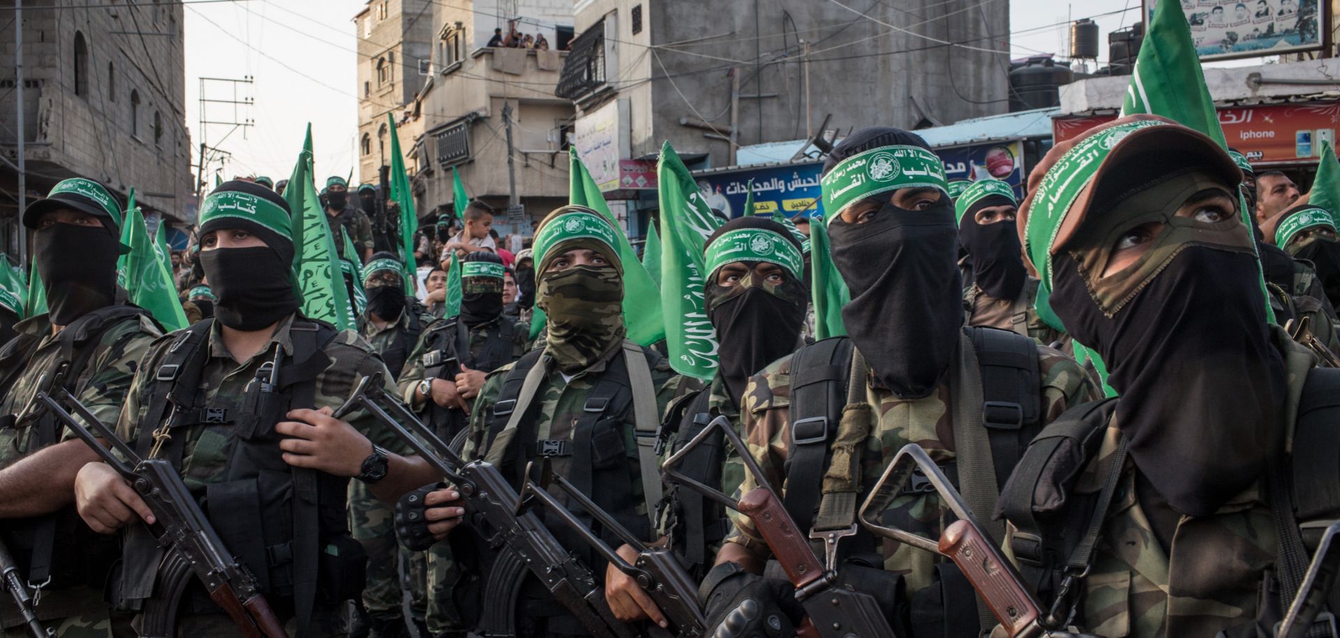 Palestinian Hamas militants are seen during a military show in Gaza City, Gaza, on July 20, 2017.