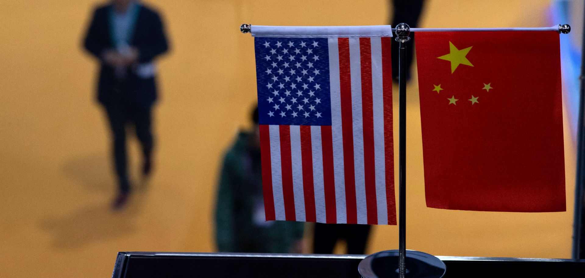 This picture taken on Nov. 6, 2018, shows Chinese and U.S. flags at a booth during the first China International Import Expo in Shanghai.