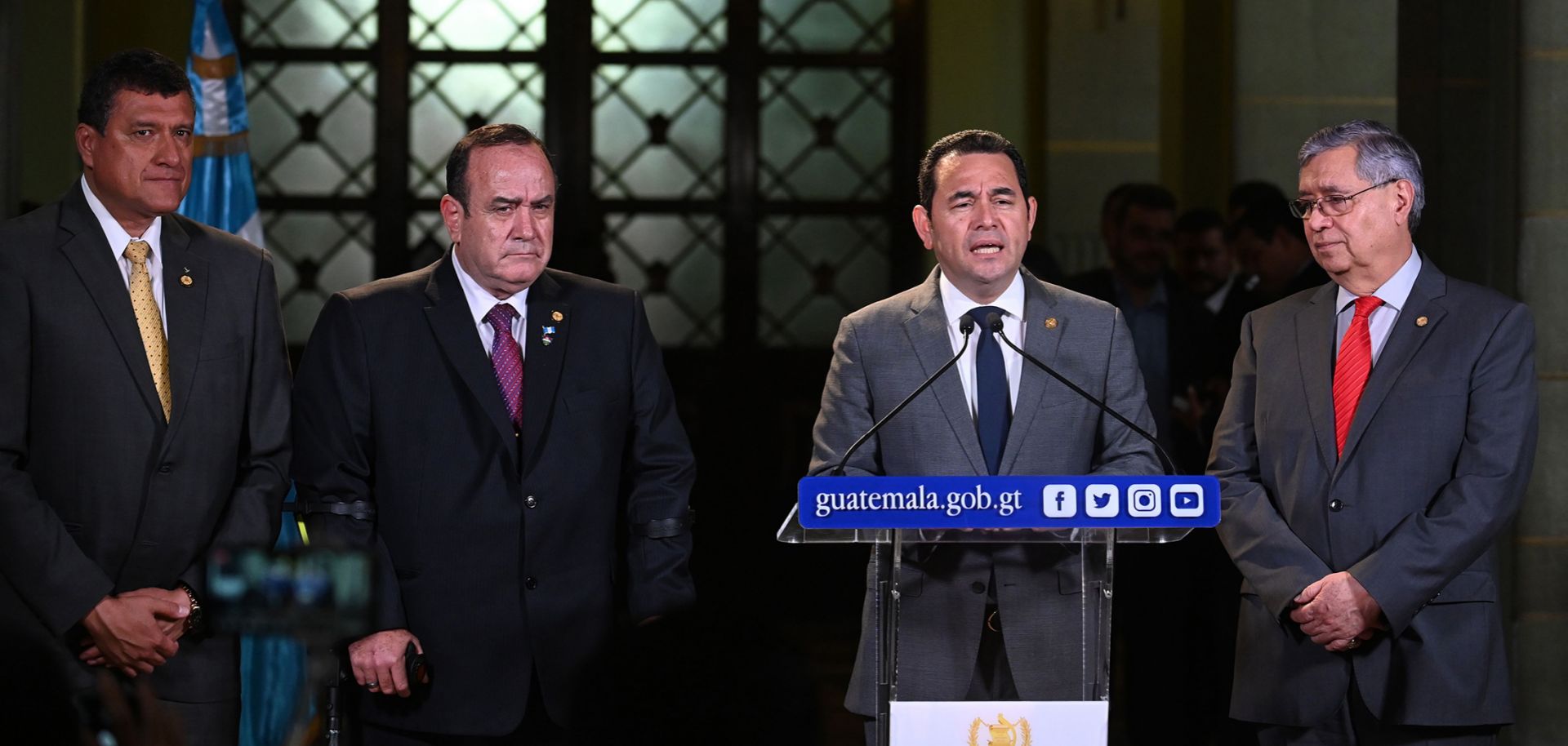 This photo shows Guatemalan President Jimmy Morales speaking to reporters during a news conference in Guatemala City on Aug. 14, 2019.