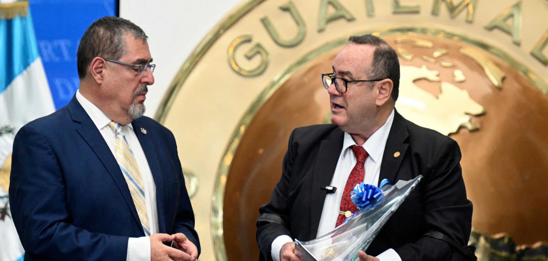Guatemalan President-elect Bernardo Arevalo and Guatemalan outgoing President Alejandro Giammattei chat at the end of the second government transition meeting on Sept. 11, 2023. 