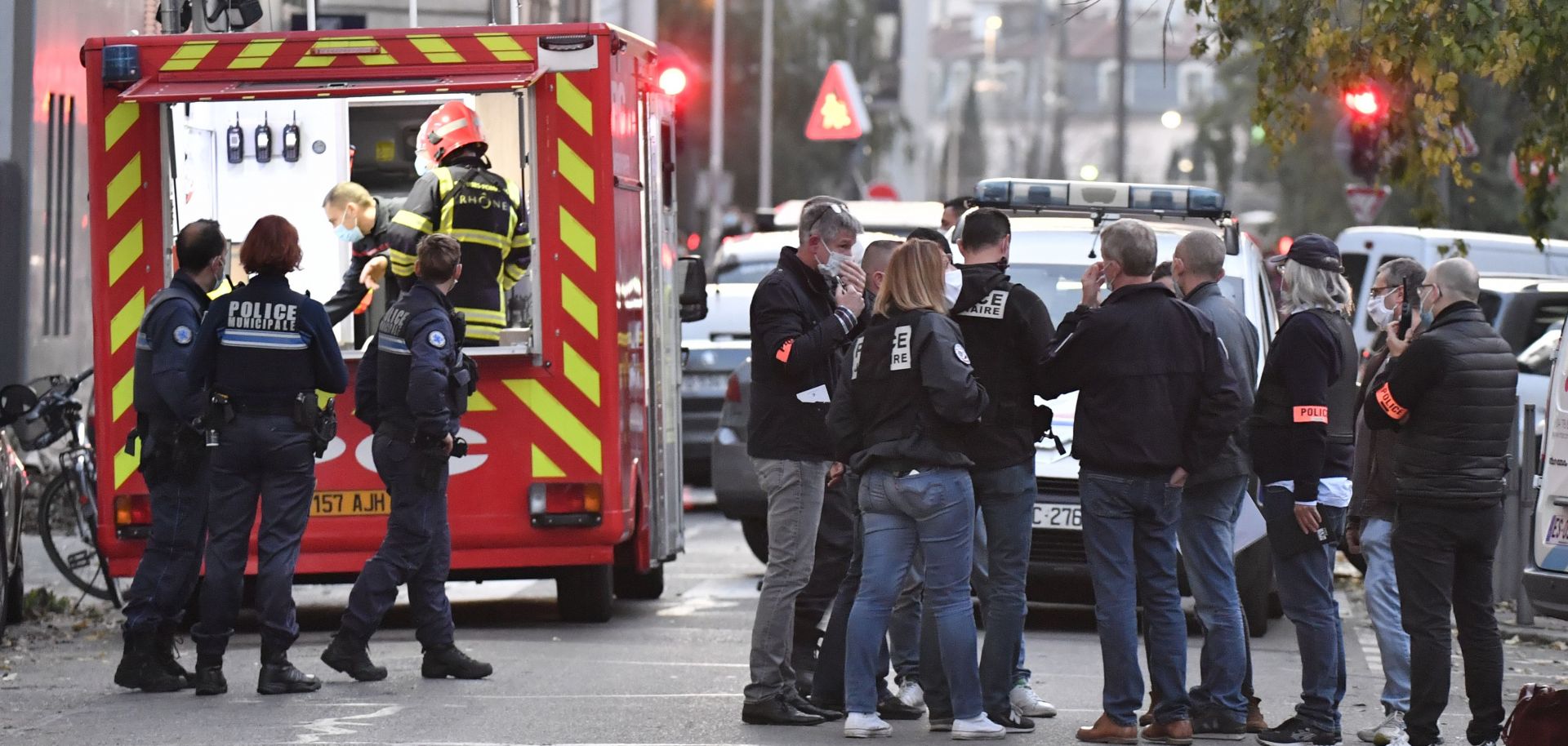 Emergency personnel on Oct. 31, 2020, in Lyon, France, at the scene of an attack on a Greek Orthodox priest.