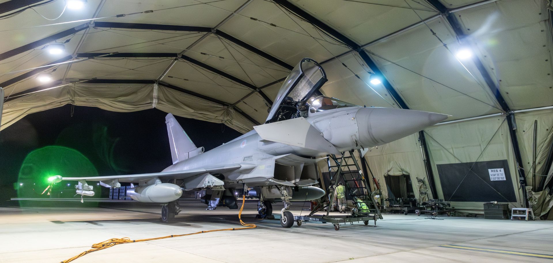 A Royal Air Force Typhoon aircraft returns to berth following a strike mission on Yemen's Houthi rebels at RAF Akrotiri on Jan. 12, 2024, in Akrotiri, Cyprus.