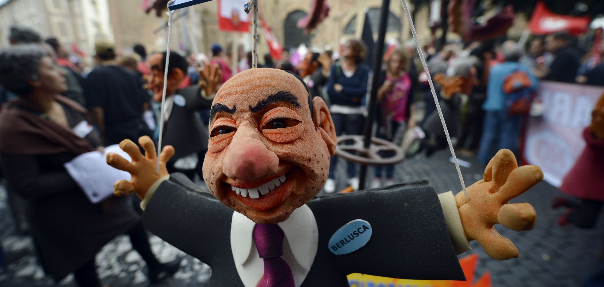 A puppet showing former Italian Prime Minister Silvio Berlusconi is displayed at the start of the No Monti Day demonstration on October 27, 2012 in Rome. 