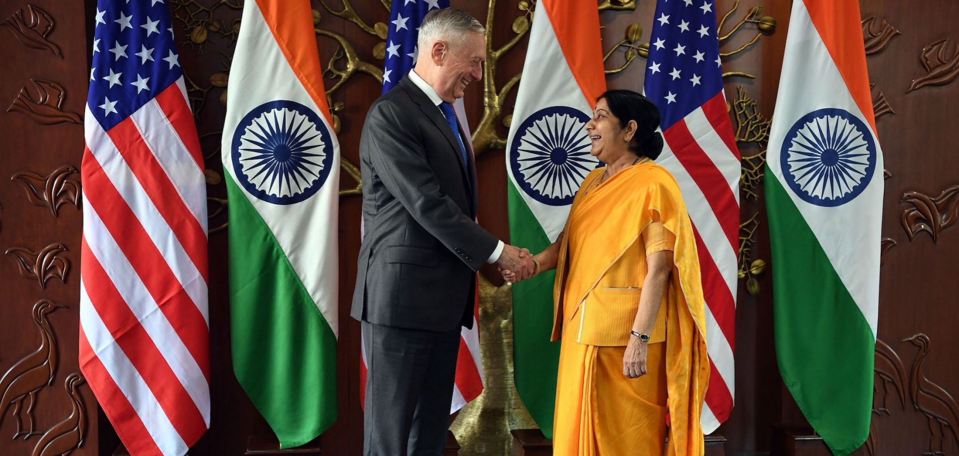U.S. Secretary of Defense Jim Mattis, left, shakes hands with Indian Foreign Minister Sushma Swaraj before the 2+2 meeting in New Delhi on Sept. 6.