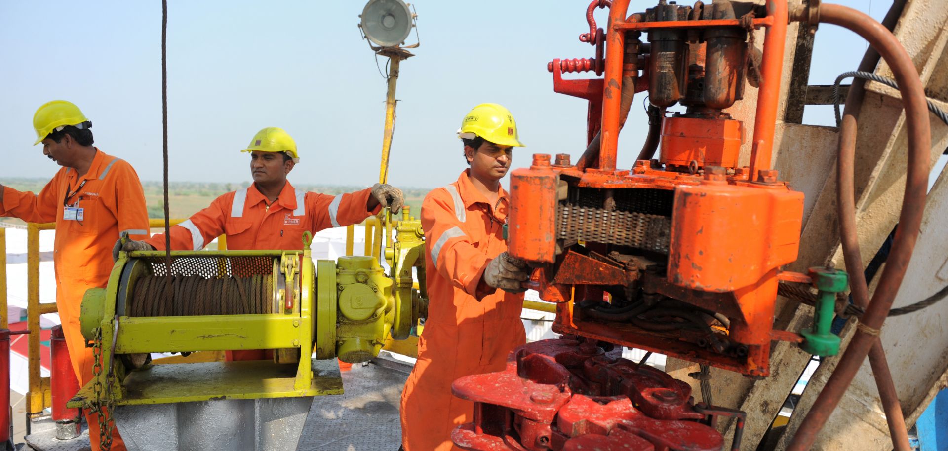 Indian technicians work on the country's first shale-gas exploratory well at ONGC Ankleshwar Asset near Jambusar, 2013.