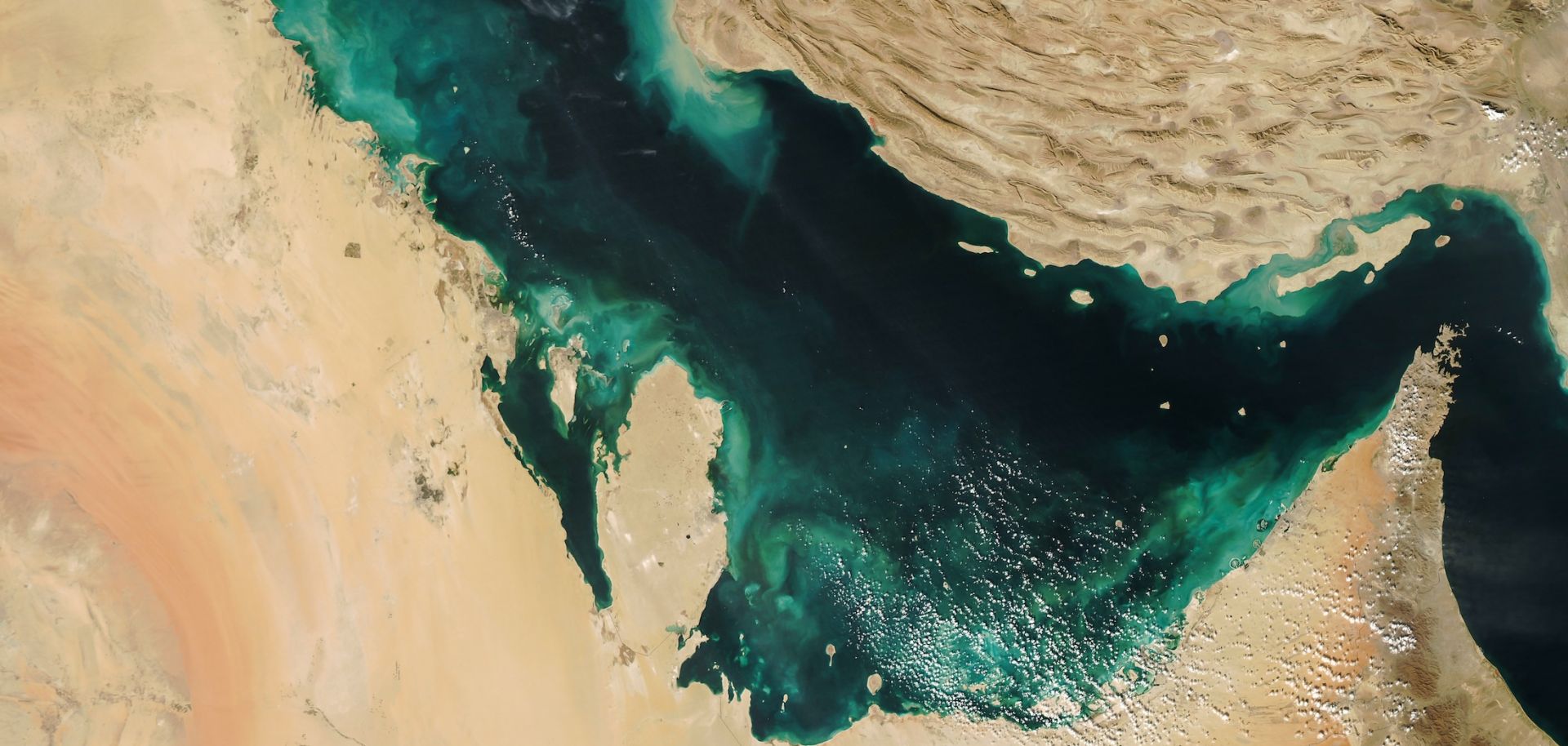 A satellite view of the Persian Gulf, with the Strait of Hormuz chokepoint seen on the right.
