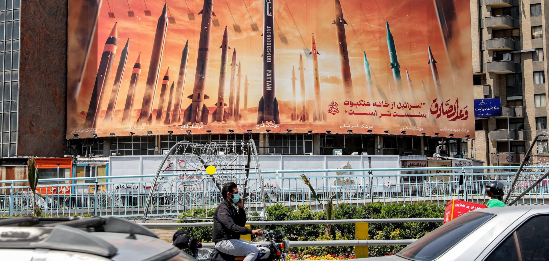 A billboard depicting Iranian ballistic missiles pictured April 15, 2024, in Valiasr Square in central Tehran.