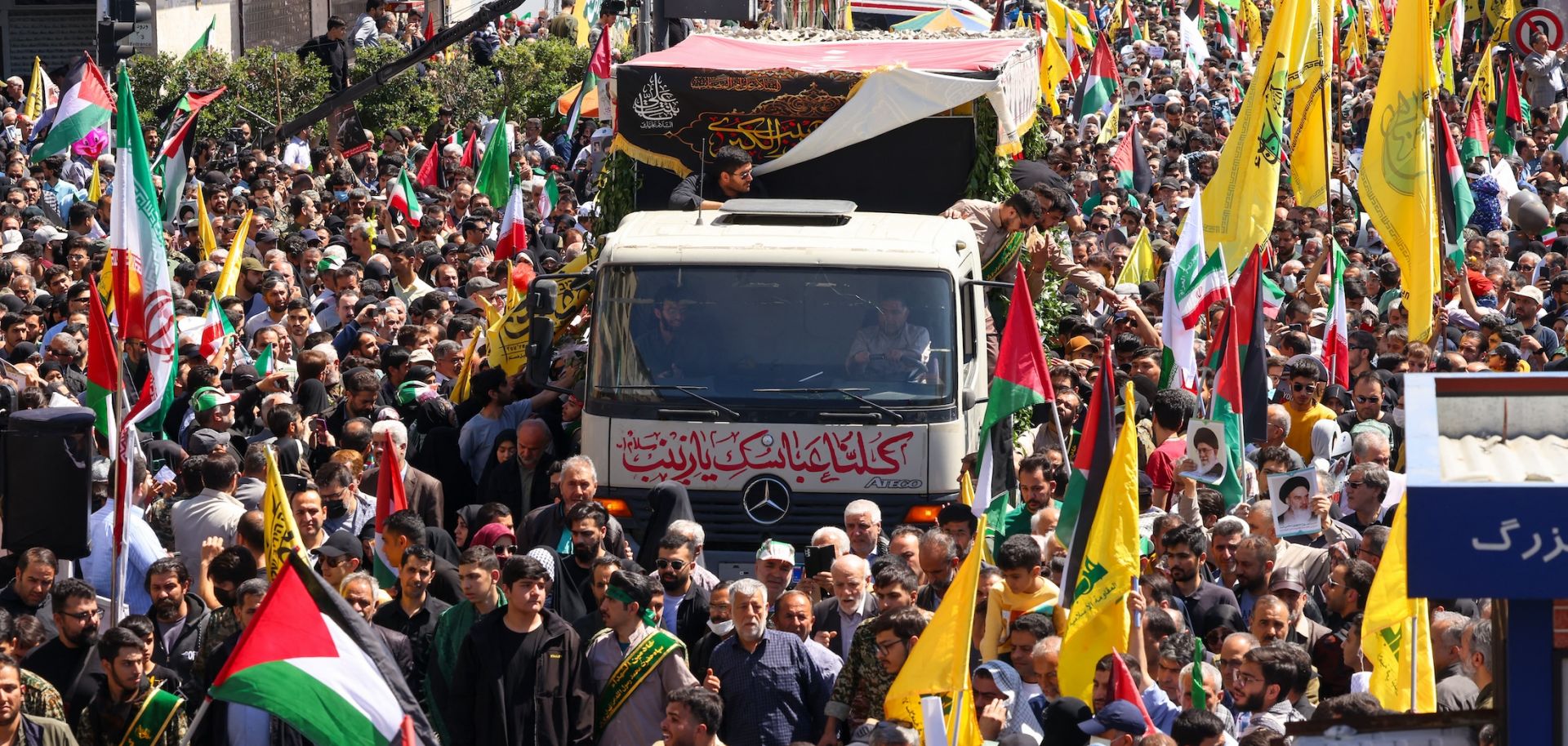 People attend an April 5, 2024, funeral procession for seven Islamic Revolutionary Guard Corps members killed in an Israeli strike in Syria.