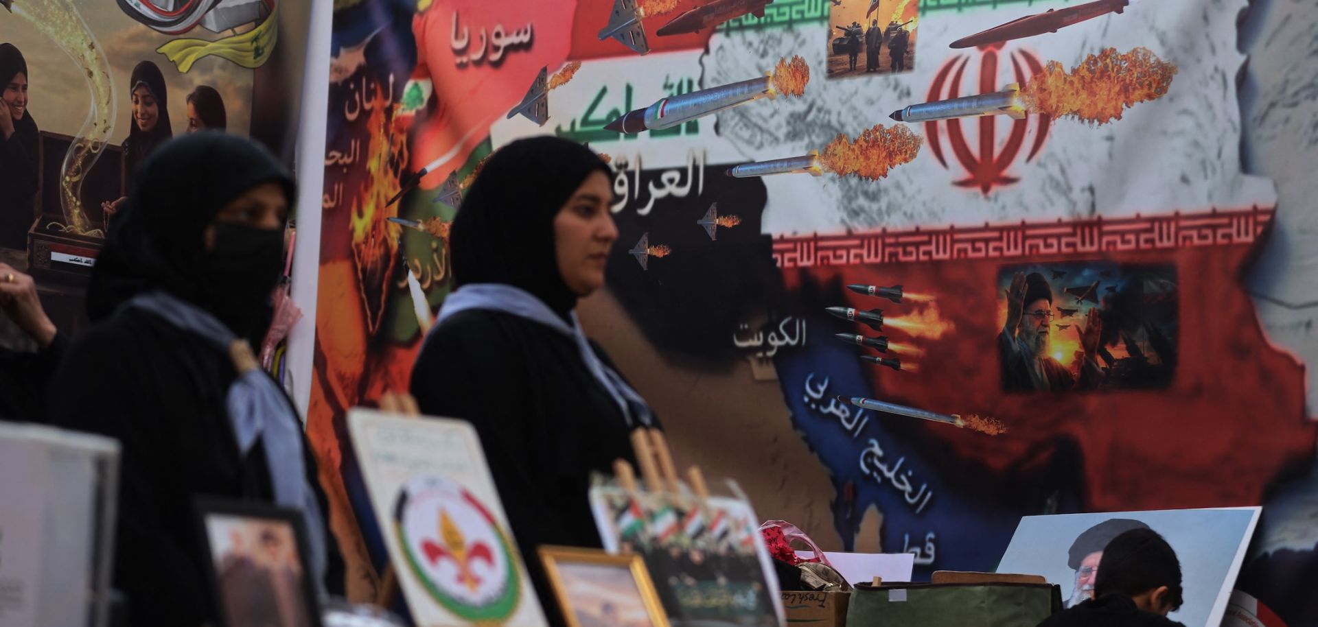 Iraqi women light candles in memory of the victims of the U.S.-Israeli attacks on Iran and Lebanon during a rally in Baghdad's Tahrir Square on April 2, 2026.