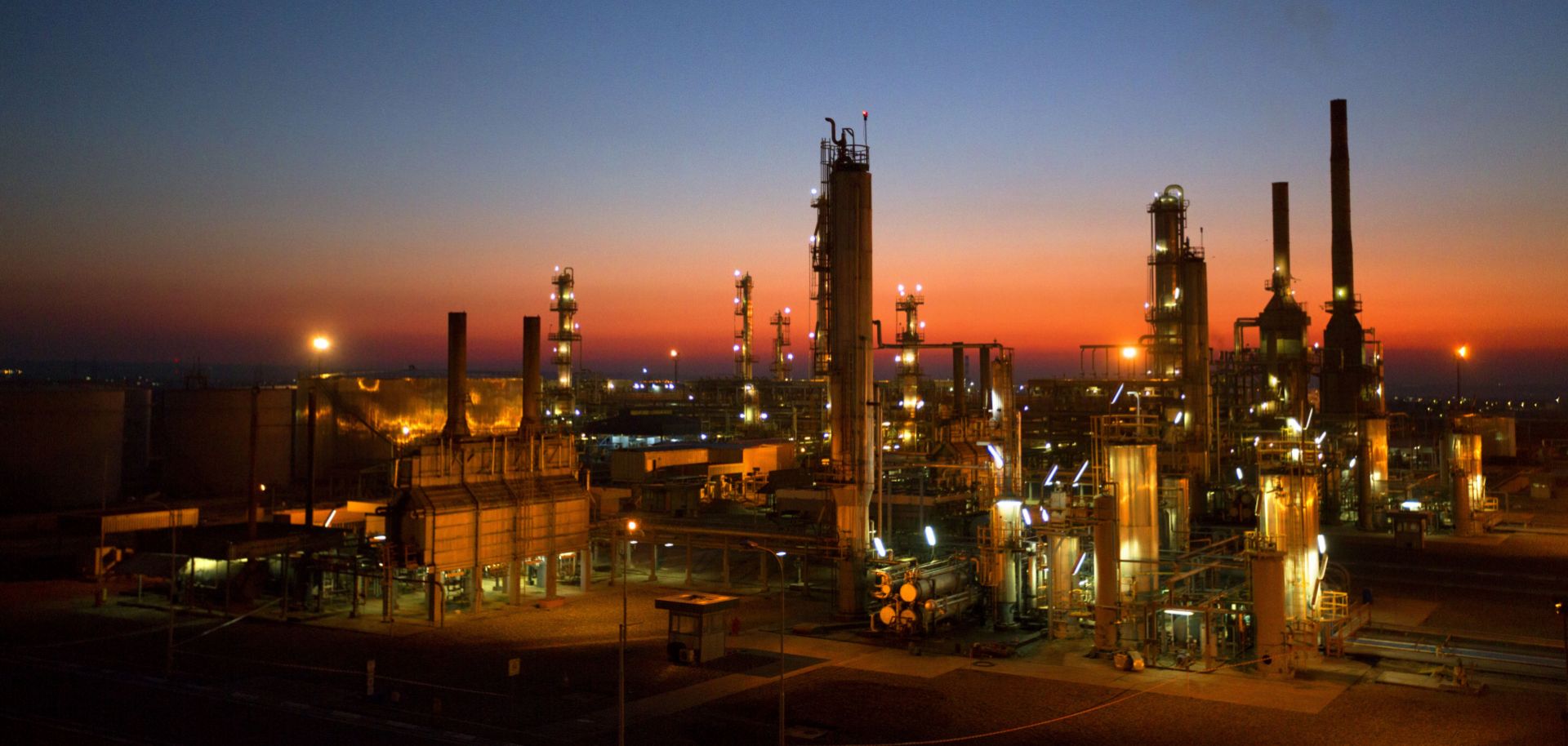 The Kawergosk oil refinery in Iraqi Kurdistan is seen at sunset. 