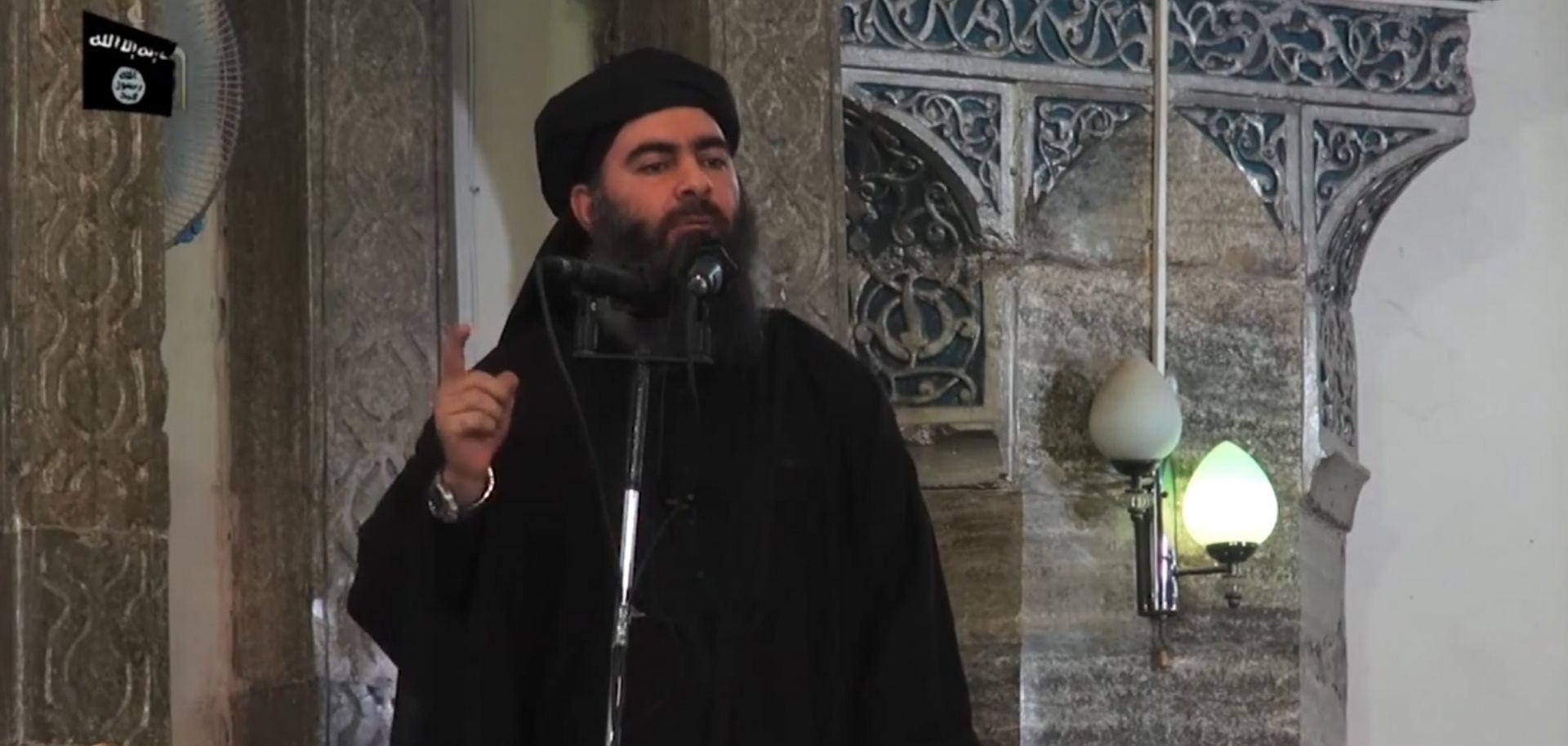 This July 5, 2014, photo shows an image grab taken from a propaganda video released by al-Furqan Media showing Islamic State leader Abu Bakr al-Baghdadi as he declares himself caliph in Mosul.