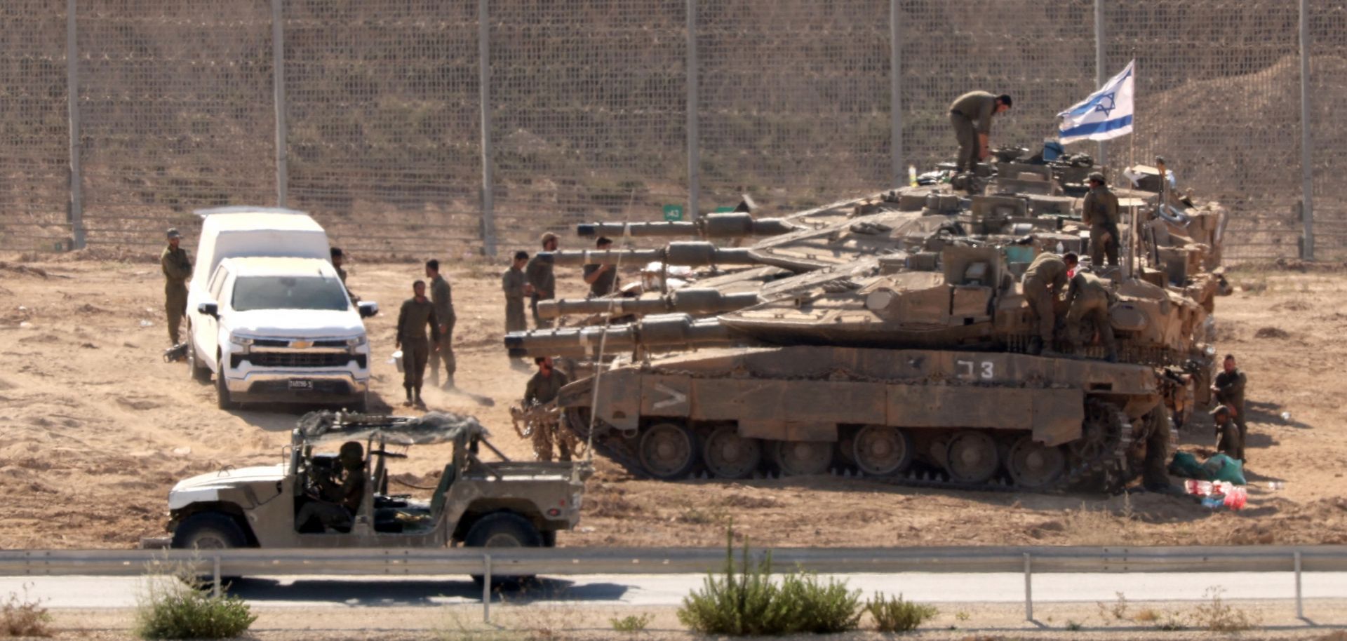 Israeli troops are seen deployed at the border with the Gaza Strip on July 23, 2025.