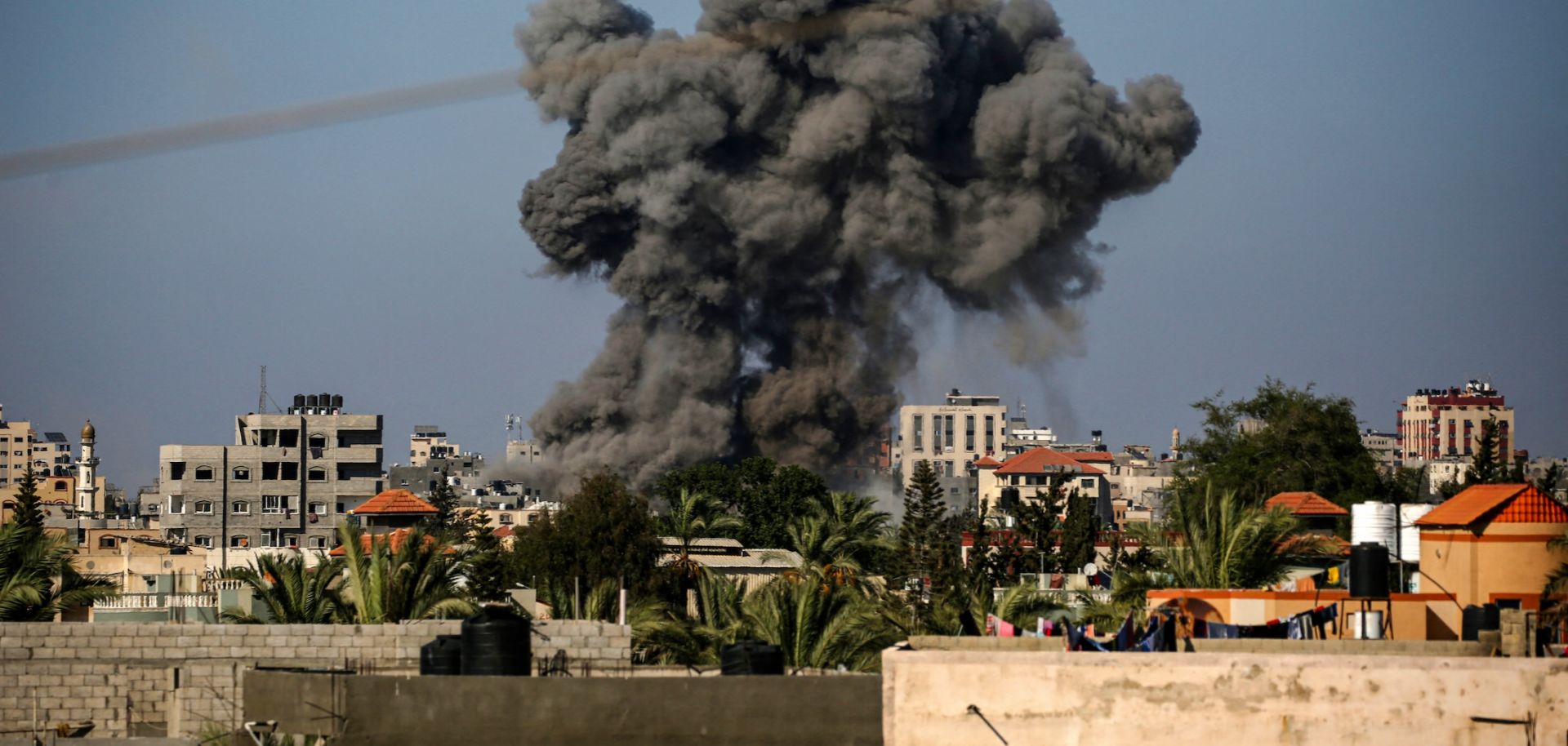 Smoke billows following an Israeli strike in Nuseirat in the central Gaza Strip on Aug. 11, 2024, amid the ongoing conflict between Israel and the Palestinian militant group Hamas.