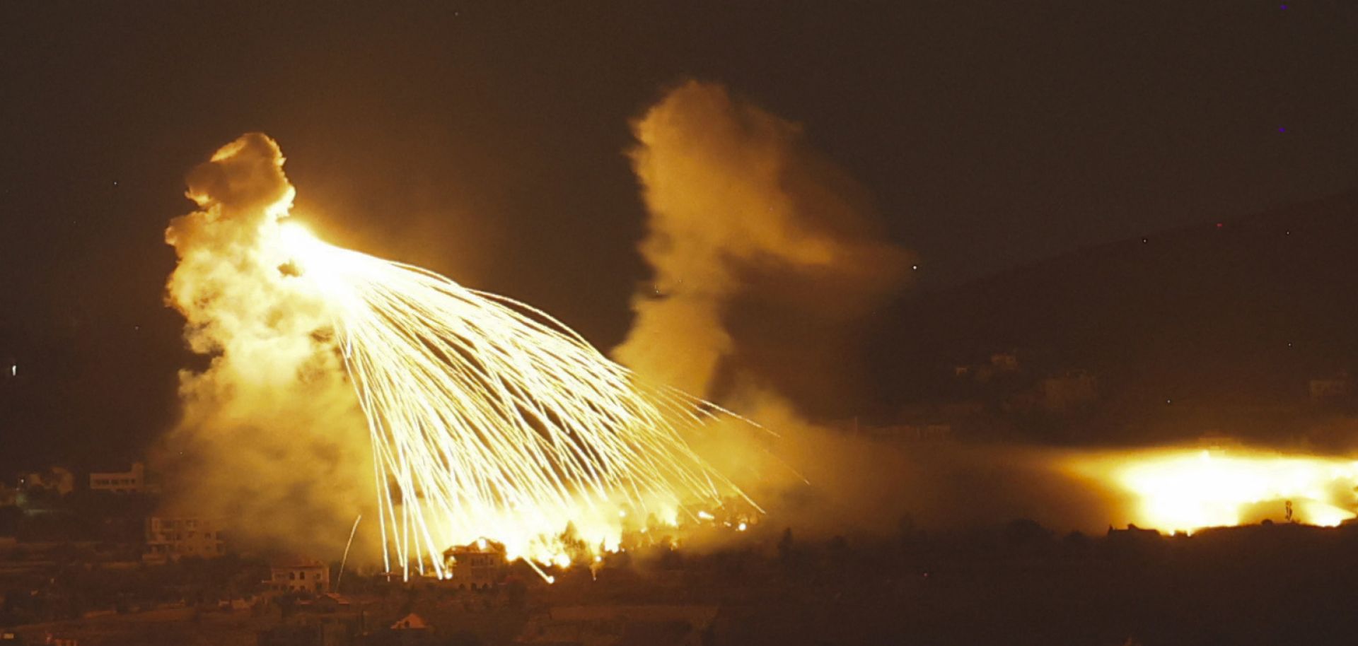 A picture taken on Sept. 30, 2024, shows a fire over an area of southern Lebanon following an Israeli bombardment. 