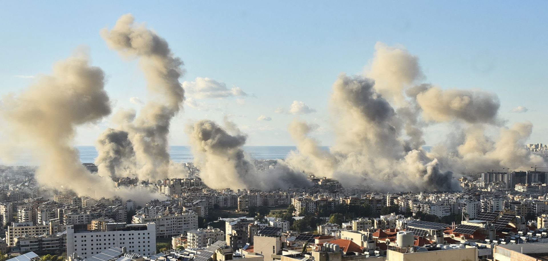 Smoke billows above Beirut's southern suburbs following an Israeli airstrike on Nov. 26, 2024, amid the ongoing war between Israel and Hezbollah. 