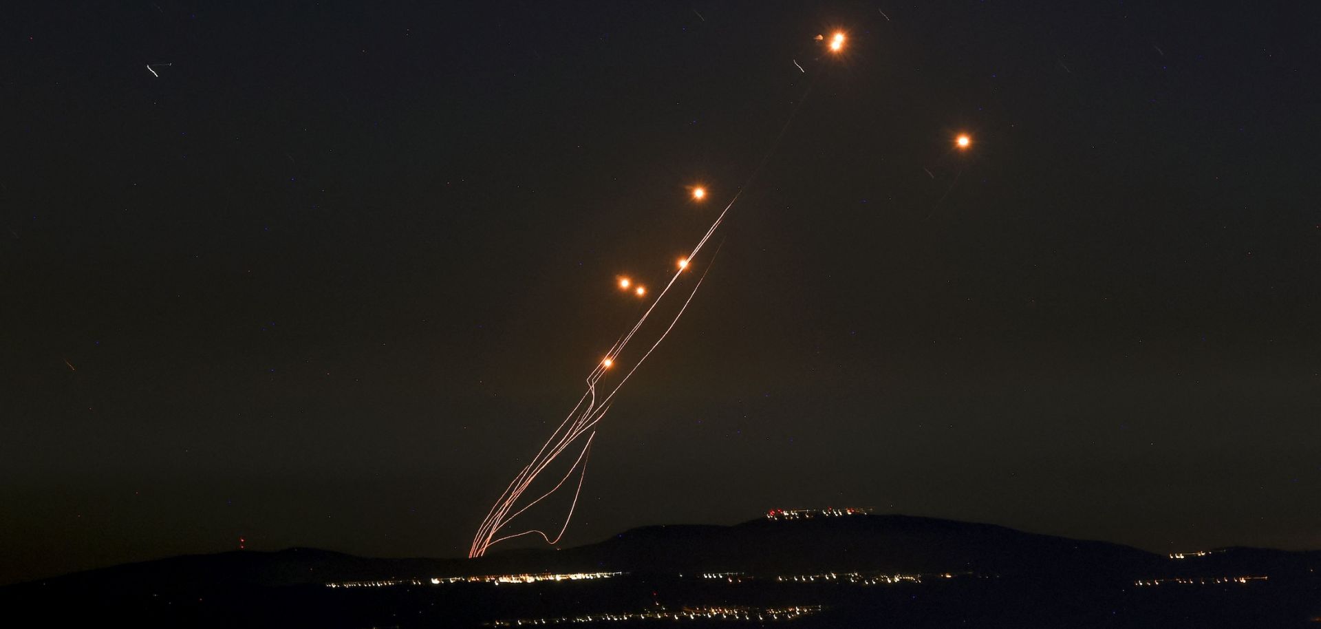 Israel's Iron Dome air defense system intercepts rockets fired from southern Lebanon on Sept. 27, 2024, over the Upper Galilee region in northern Israel.