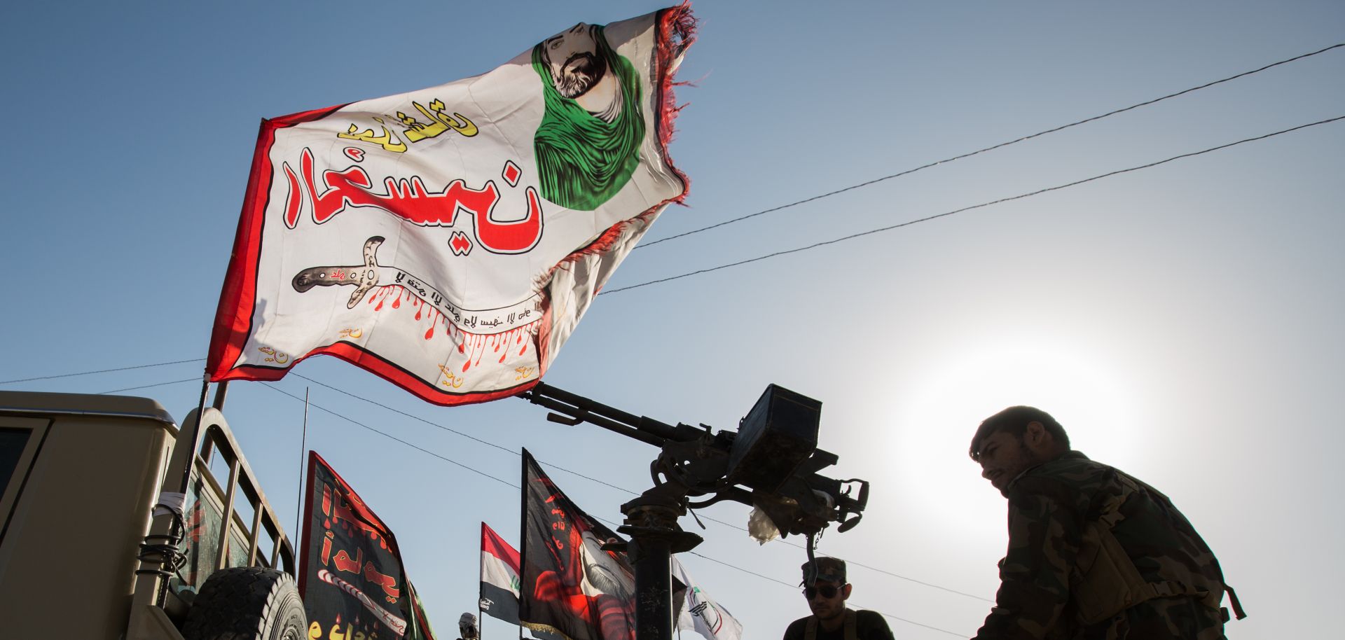 Fighters of a Shiite militia are seen in a training camp south of Mosul in this undated photo.