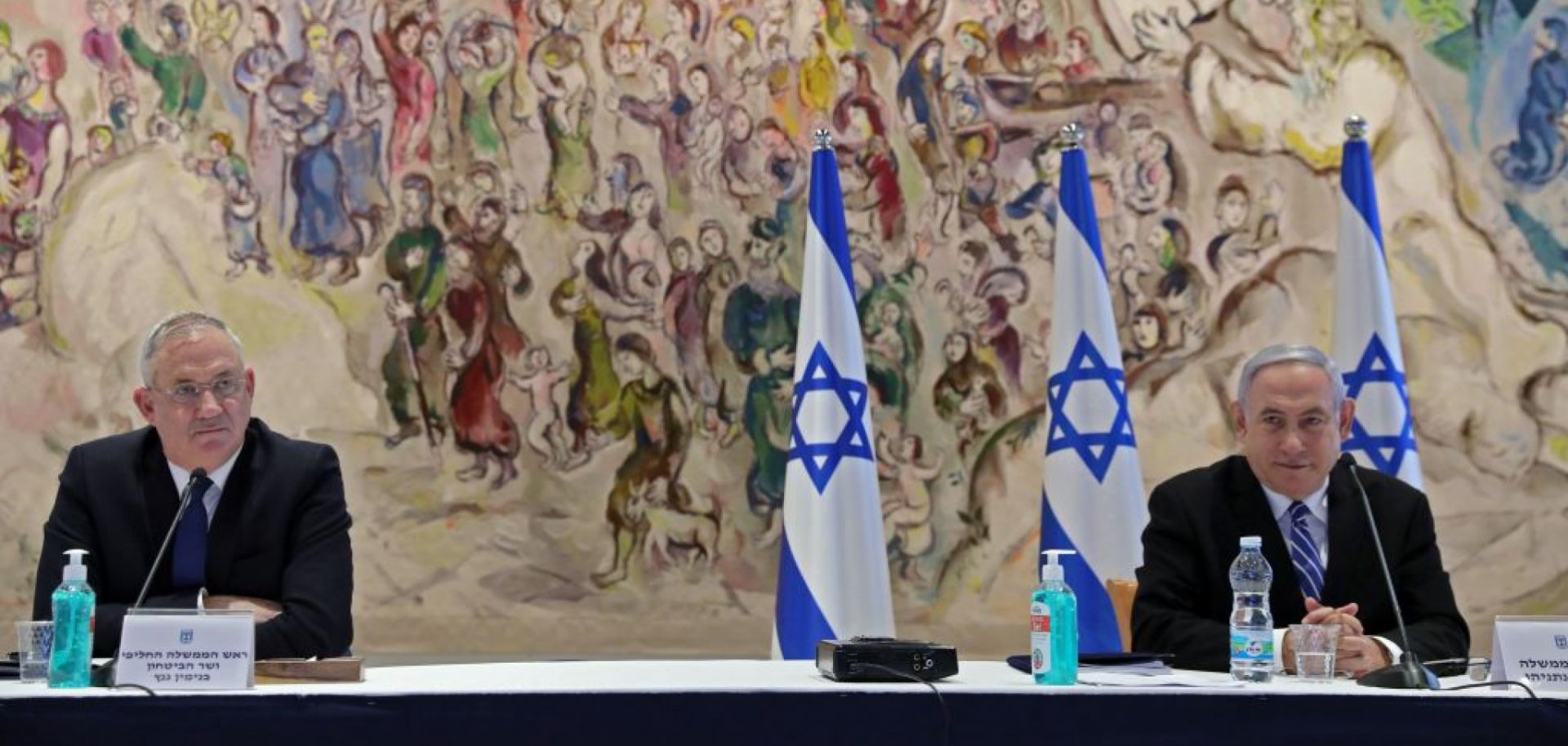 Israeli Prime Minister Benjamin Netanyahu (R) and Alternate Prime Minister and Defense Minister Benny Gantz on May 24, 2020, at a Cabinet meeting of Israel's new unity government at Chagall State Hall in the Knesset in Jerusalem.