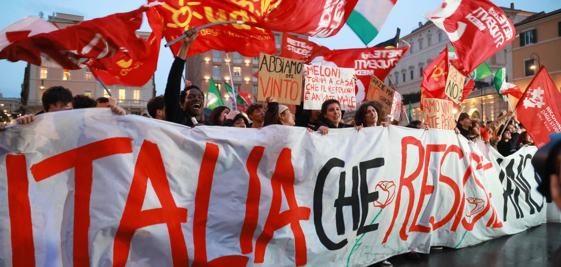 Opposition supporters celebrate the defeat of a referendum on justice reform March 23 in Rome.