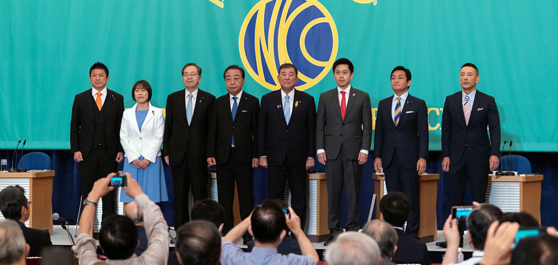 Leaders of eight political parties pose before a debate at the Japan National Press Club on July 2, 2025, in Tokyo, Japan. From left to right are Sanseito Secretary General Sohei Kamiya, Japanese Communist Party Chairperson Tomoko Tamura, Komeito Chief Representative Tetsuo Saito, Constitutional Democratic Party President Yoshihiko Noda, Japan's Prime Minister and Liberal Democratic Party President Shigeru Ishiba, Governor of Osaka and Japan Innovation Party Co-Representative Hirofumi Yoshimura, Democratic