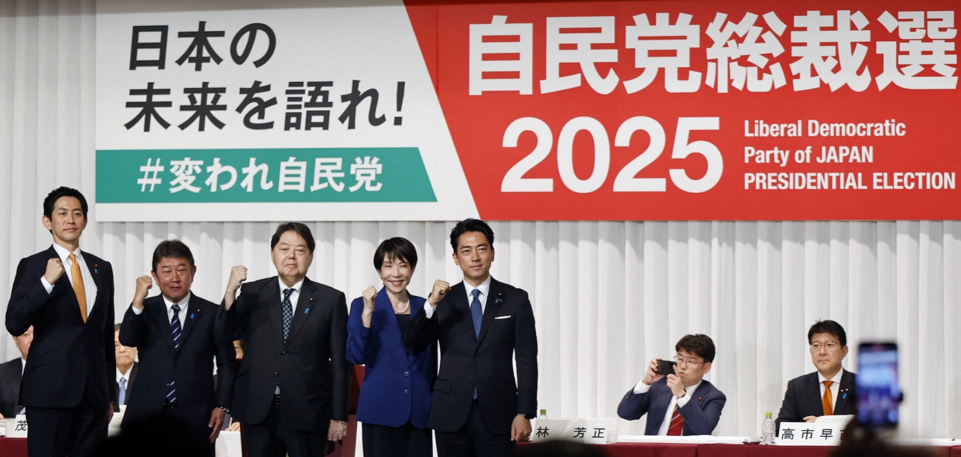 The candidates running in the leadership election of Japan's ruling Liberal Democratic Party -- (from left to right) Takayuki Kobayashi, Toshimitsu Motegi, Yoshimasa Hayashi, Sanae Takaichi and Shinjiro Koizumi -- pose after delivering speeches at the kick-off of the campaign in Tokyo on Sept. 22, 2025. 