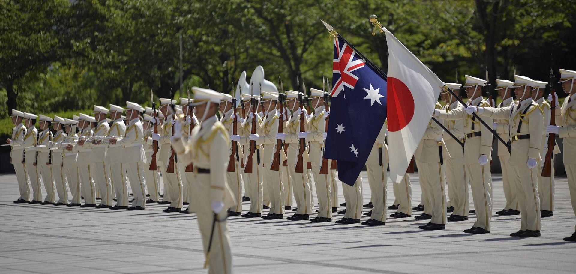 A Japanese honor guard welcomes the Australian defense minister during a visit in August 2016.