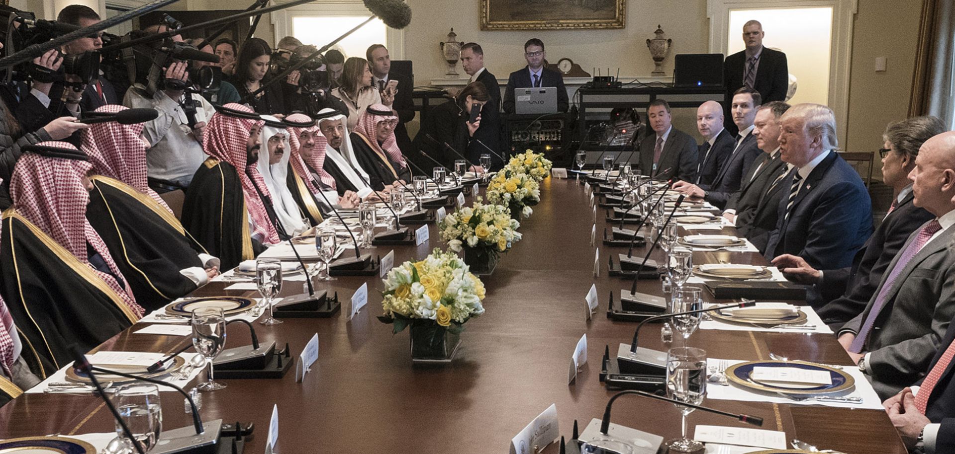 U.S. President Donald Trump leads a U.S. delegation at a working lunch with Saudi Crown Prince Mohammed bin Salman and his aides.