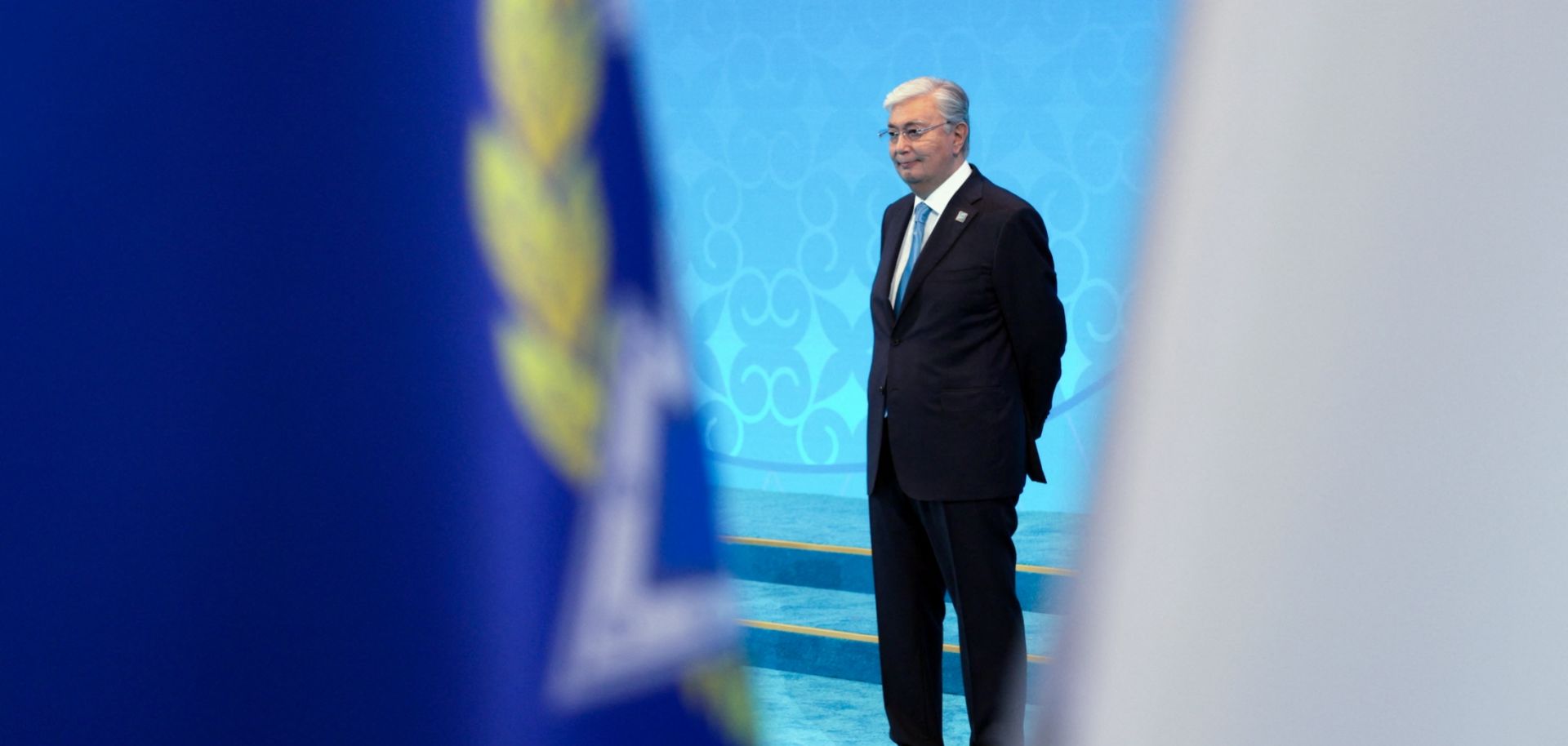 Kazakh President Kassym-Jomart Tokayev waits to greet foreign leaders during the Shanghai Cooperation Organization member states leaders' summit in Astana on July 4, 2024.