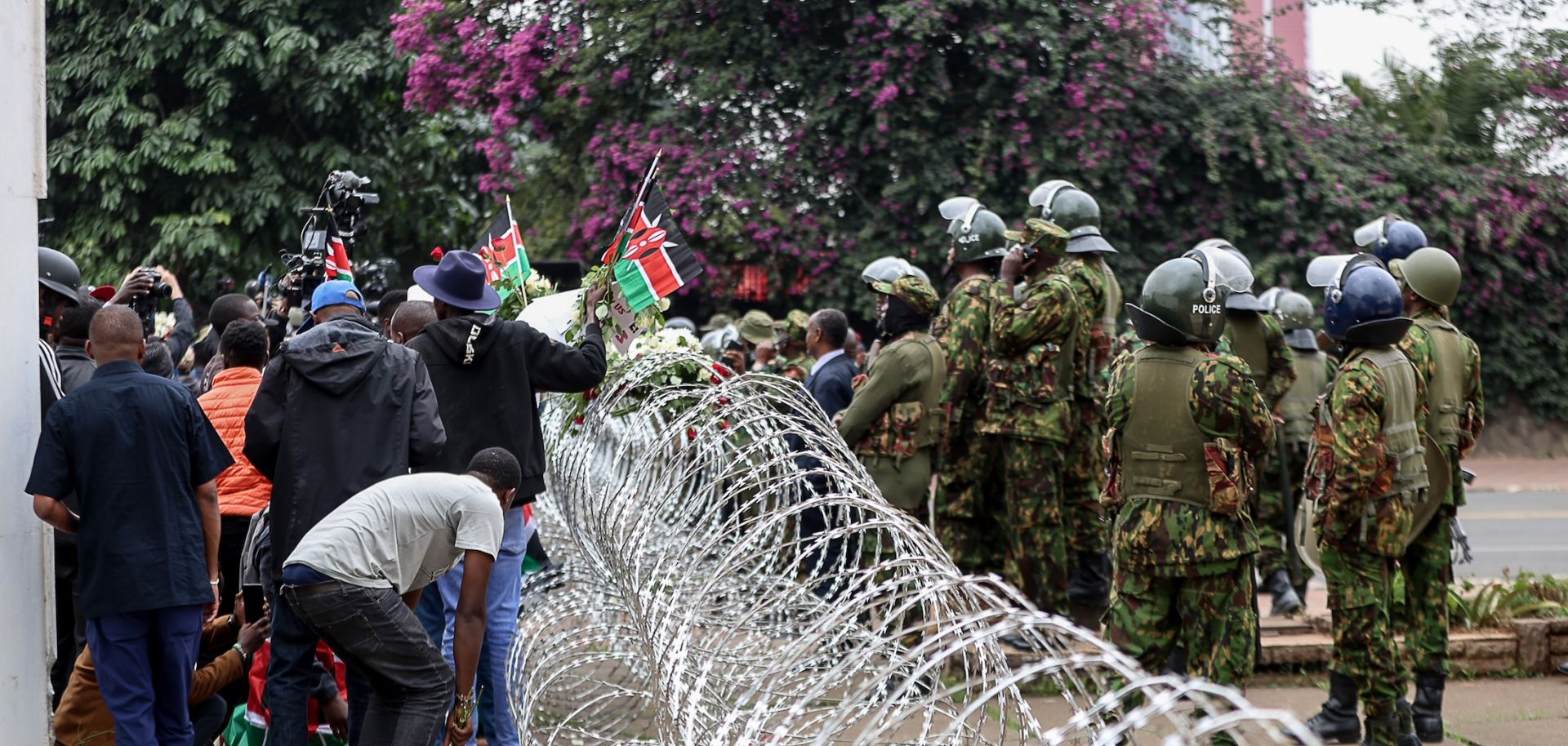Protesters march outside Parliament to honor victims of the June 25, 2024, protest on June 25, 2026, in Nairobi, Kenya.