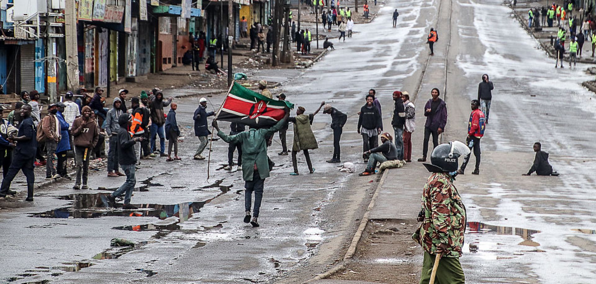 A demonstrator holds a Kenyan flag on a street in Nairobi, Kenya, during a pro-democracy protest on July 7, 2025. 
