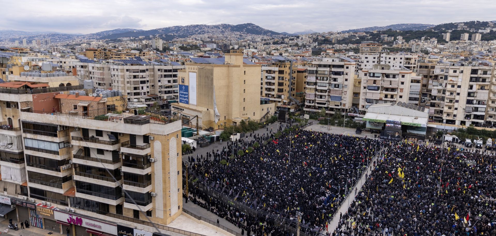 People attend a gathering honoring Iran's former Supreme Leader, Ayatollah Ali Khamenei, on March 1, 2026, at Ashura Square in southern Beirut, Lebanon.