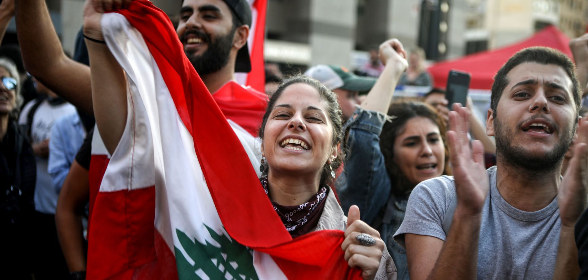 Anti-government protesters in Beirut celebrate Lebanese Prime Minister Saad al-Hariri's resignation on Oct. 29, 2019.